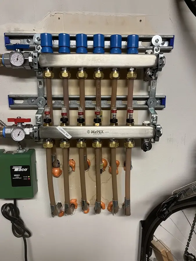 Plumber performing Leak Detection at a residential property in West St. Paul